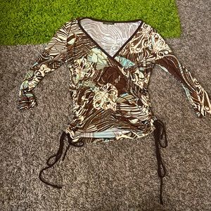 Cute brown top, ruched with adjustable strings, and mid length sleeves